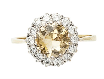 Lot 181 - A topaz and diamond set cluster ring
