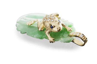 Lot 174 - A jade, diamond and sapphire set pendant