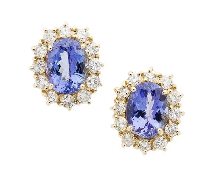 Lot 179 - A pair of 18ct gold Tanzanite and diamond set cluster earrings