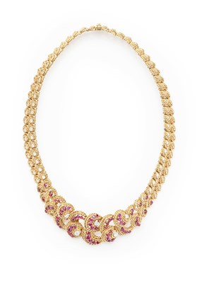 Lot 153 - LALOCHE - A gold, diamond and ruby set necklace
