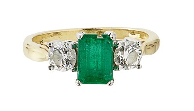 Lot 143 - An emerald and diamond set ring