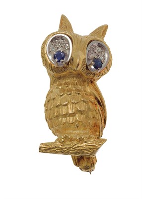 Lot 176 - An 18ct two colour gold, diamond and sapphire set humorous owl brooch