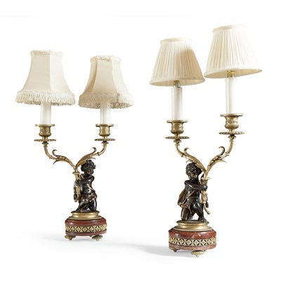 Lot 26 - A PAIR OF BRONZE AND GILT METAL MOUNTED TWIN-BRANCH CANDELABRA
