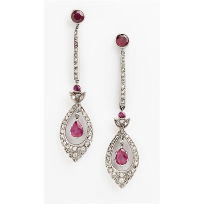 Lot 53 - A pair of ruby and diamond set pendant earrings