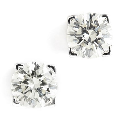 Lot 136 - A pair of diamond stud earrings