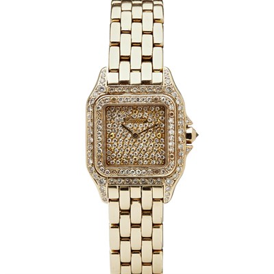 Lot 74 - CARTIER - A lady's 18ct gold and diamond set wrist watch