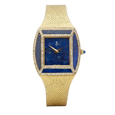 Lot 76 - CORUM - A lady's 18ct gold diamond and lapis set wrist watch