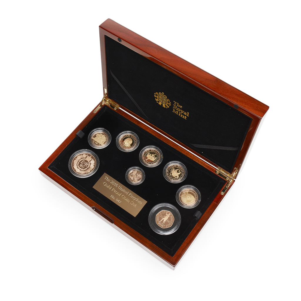 65 - U.K. - A cased gold proof coin set