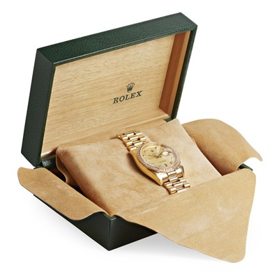 Lot 243 - An 18ct gold and diamond set gentleman's wrist watch, Rolex