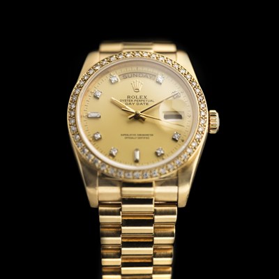Lot 243 - An 18ct gold and diamond set gentleman's wrist watch, Rolex