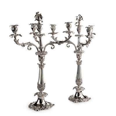 Lot 495 - A pair of  William IV four light table candelabra