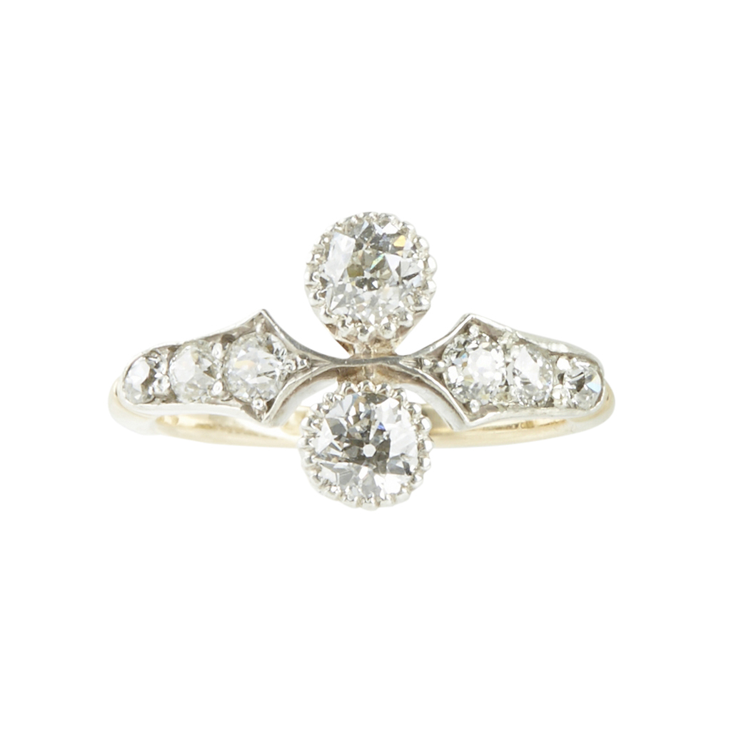 Lot 104 - A two stone diamond ring