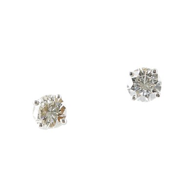 Lot 83 - A pair of 18ct gold diamond set ear studs