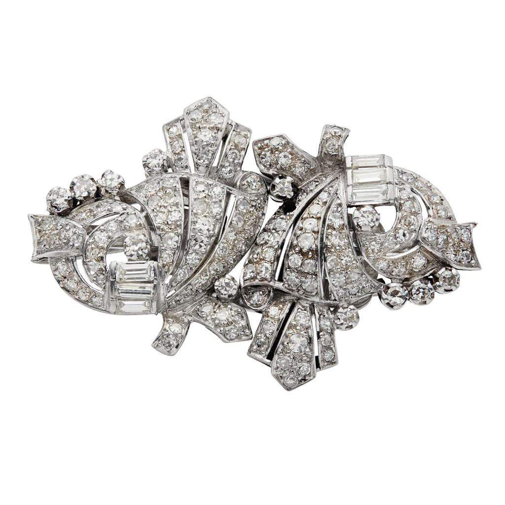 Lot 56 - An early 20th century diamond set clip brooch