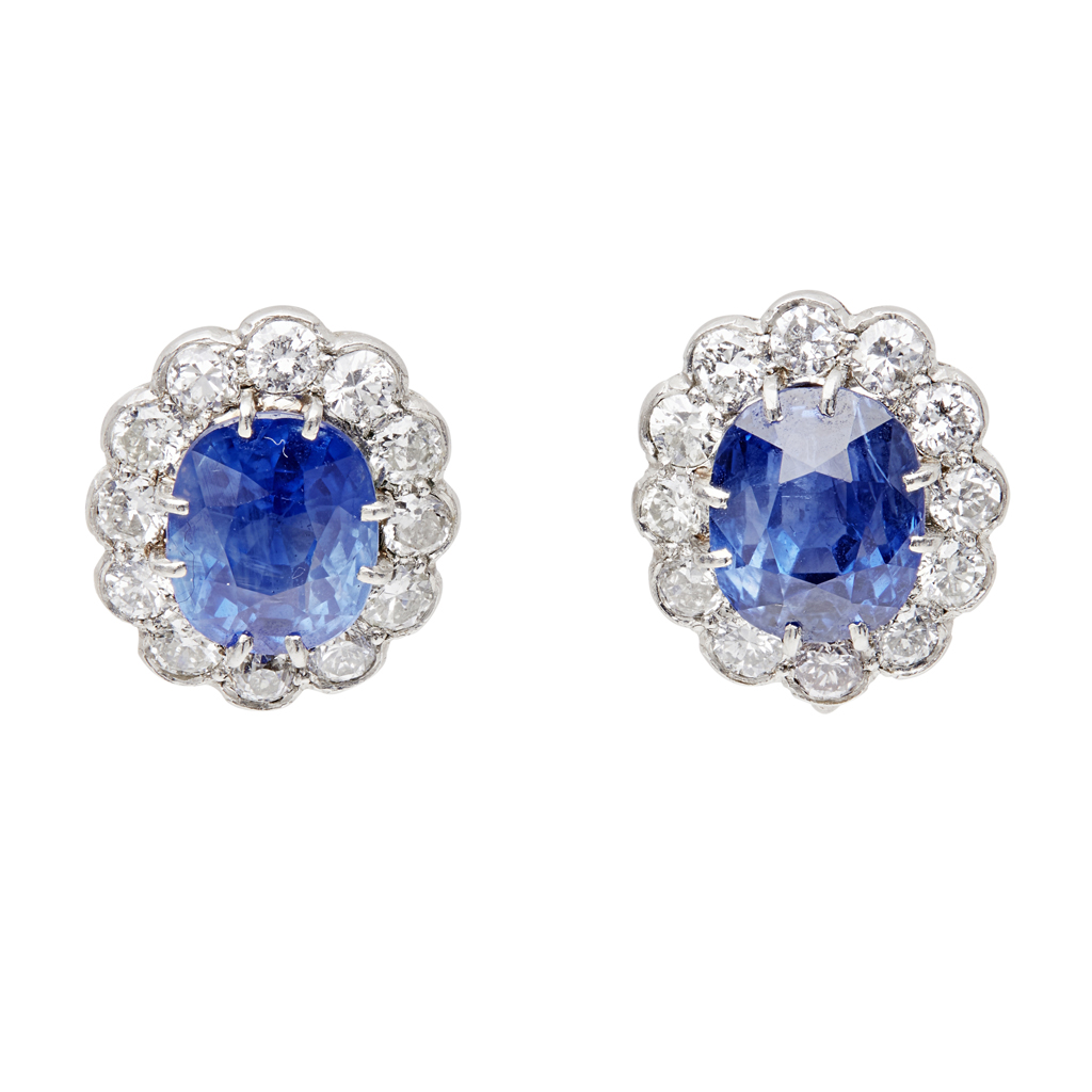 Lot 70 - A pair of sapphire and diamond set cluster earrings