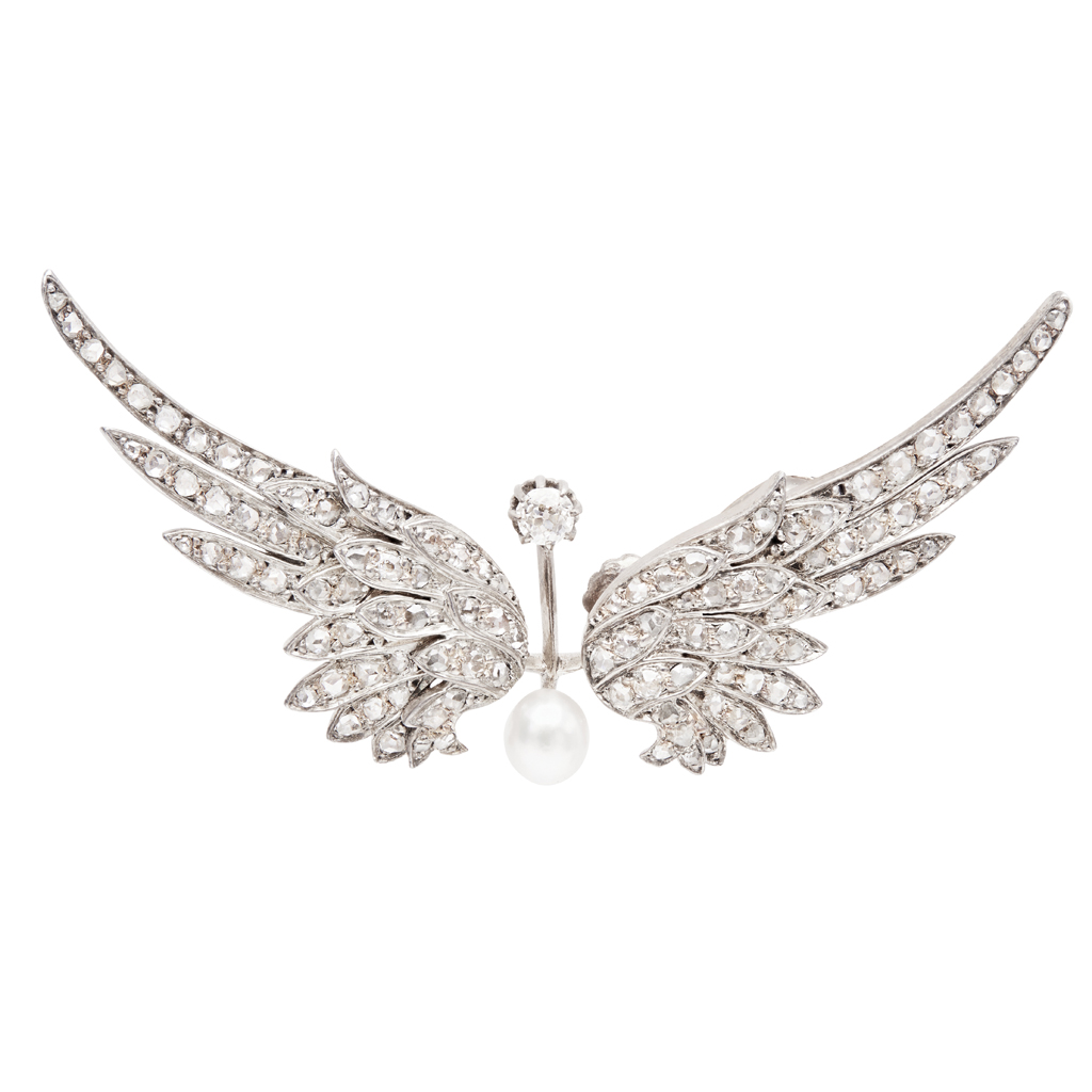 Lot 135 - A French Belle Époque diamond set 'winged' brooch