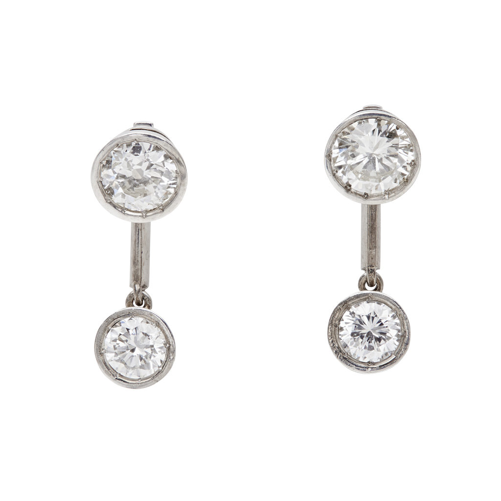 Lot 80 - A pair of diamond set pendant earrings