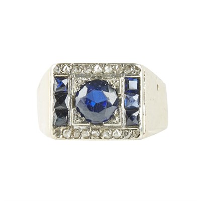 Lot 76 - A gentleman's synthetic sapphire and diamond set ring