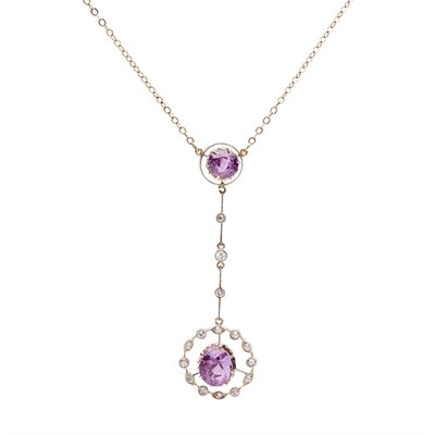 Lot 224 - A pink sapphire and diamond set pendant