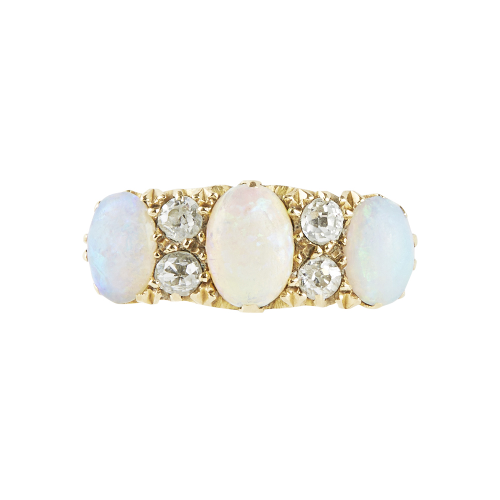 Lot 134 - A 18ct gold diamond and opal set ring