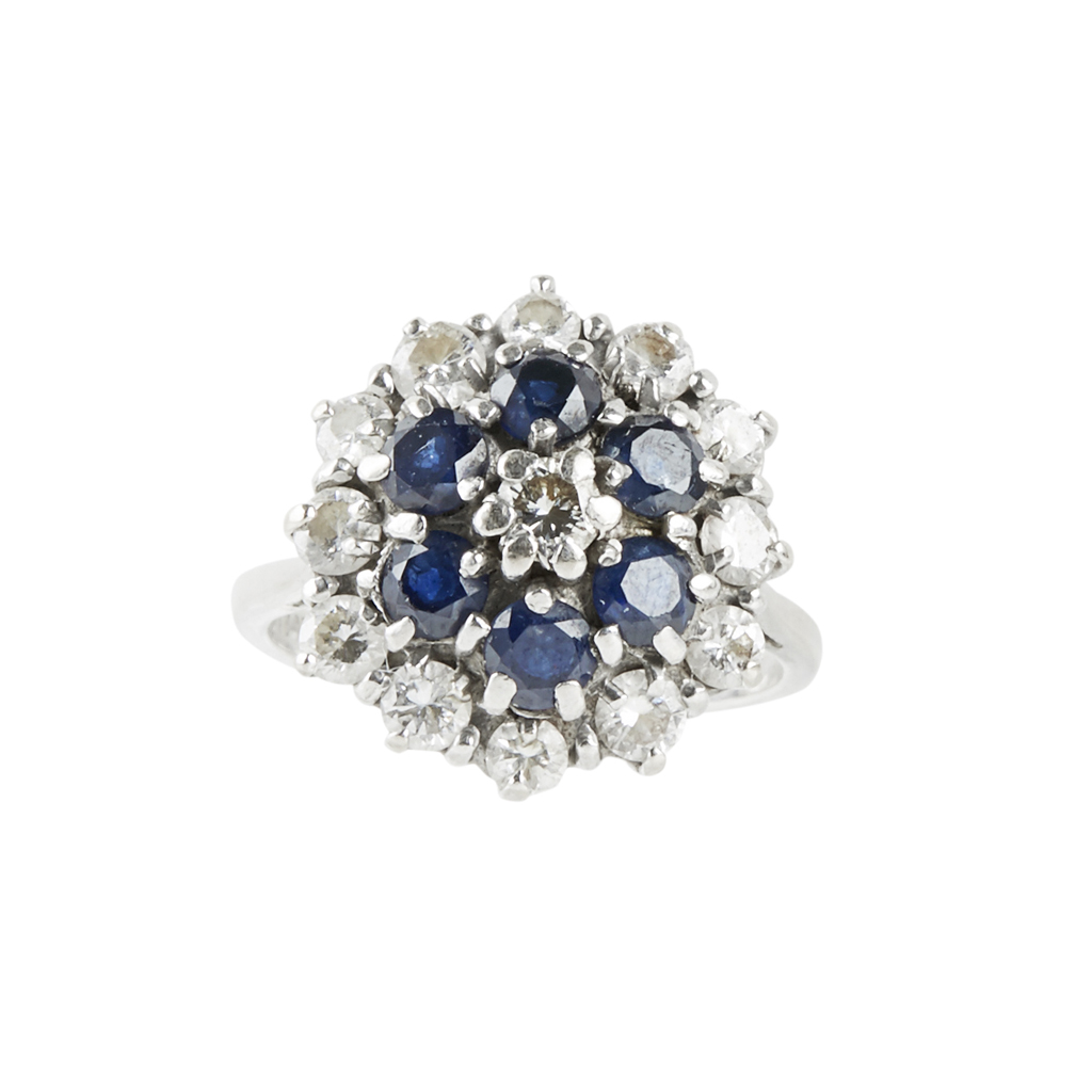 Lot 75 - A sapphire and diamond set cluster ring