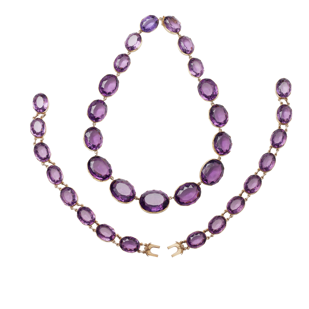 Lot 33 - An amethyst set necklace and matching bracelets