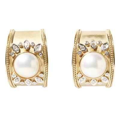 Lot 153 - A pair of 1980s pearl and diamond set earrings