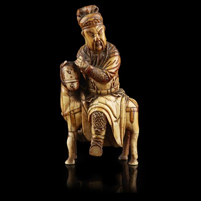 Lot 31 - CARVED IVORY EQUESTRIAN FIGURE OF GUANDI