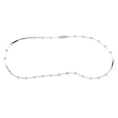 Lot 5 - A contemporary 18ct white gold and diamond set line necklace