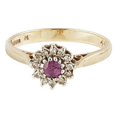 Lot 268 - A 9ct gold ruby and diamond set cluster ring
