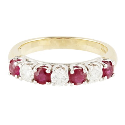 Lot 131 - A ruby and diamond set half-eternity ring