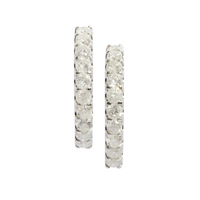 Lot 68 - A pair of diamond set hoop earrings