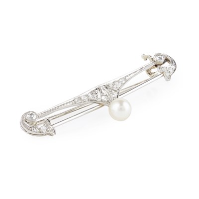 Lot 6 - An early 20th century diamond and pearl set bar brooch