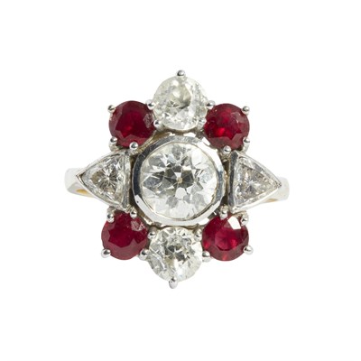 Lot 120 - A ruby set cluster ring