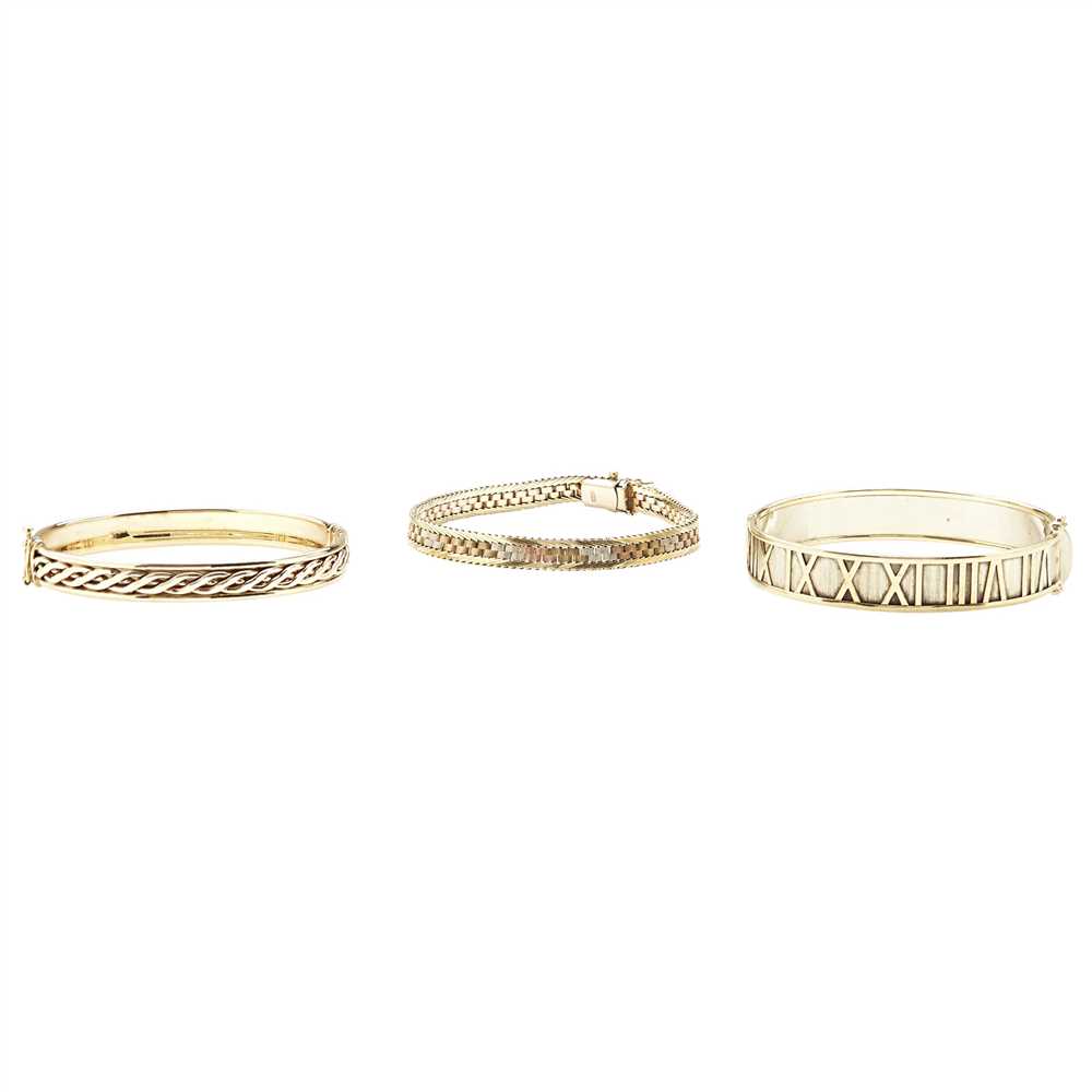 Lot 241 - Two modern 9ct gold bangles