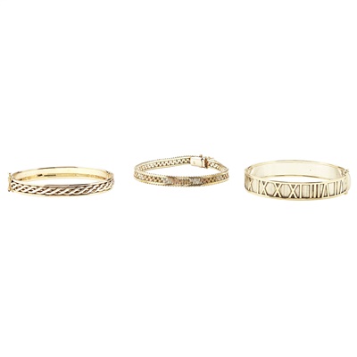 Lot 241 - Two modern 9ct gold bangles
