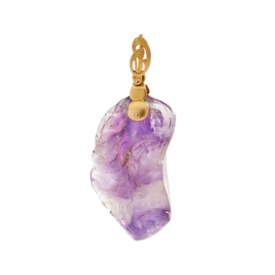 Lot 351 - A carved amethyst pendant