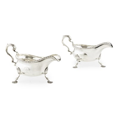 Lot 404 - A PAIR OF GEORGE III SAUCE BOATS