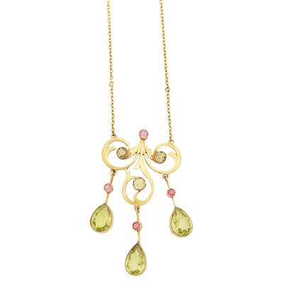 Lot 83 - A peridot and pink tourmaline set pendant
