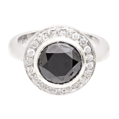 Lot 203 - A black and colourless diamond set cluster ring