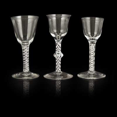 Lot 137 - THREE GEORGIAN OPAQUE TWIST STEM WINE GLASSES