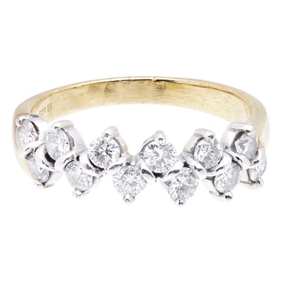 Lot 12 - A diamond set half-eternity ring