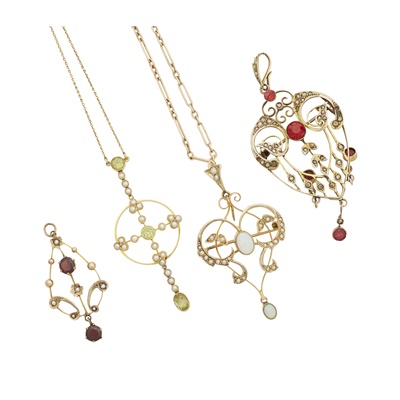 Lot 282 - A collection of four gem set pendants