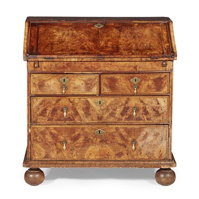 Lot 74 - QUEEN ANNE WALNUT AND FEATHER-BANDED BUREAU