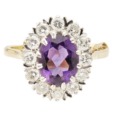 Lot 167 - An amethyst and diamond set cluster ring