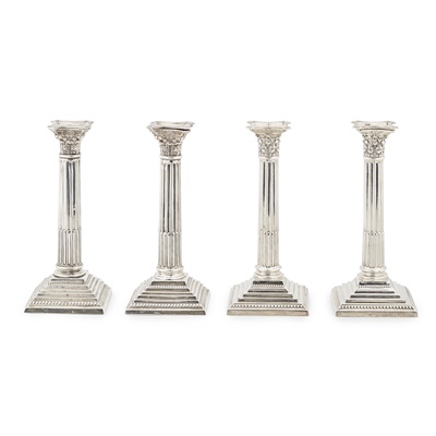 Lot 475 - Four matched early 20th century Corinthian column candlesticks