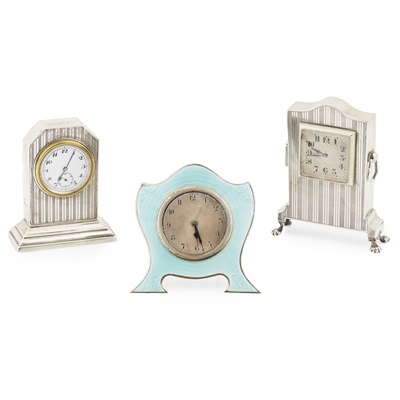 Lot 444 - Three small silver cased dressing table clocks