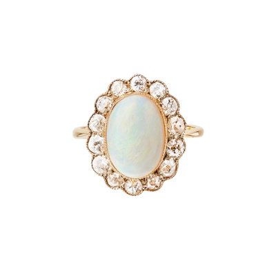 Lot 68 - An opal and diamond set cluster ring