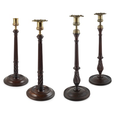 Lot 109 - TWO PAIRS OF GEORGE III MAHOGANY AND BRASS CANDLESTICKS