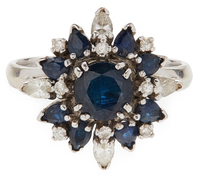 Lot 17 - A sapphire and diamond set cluster ring